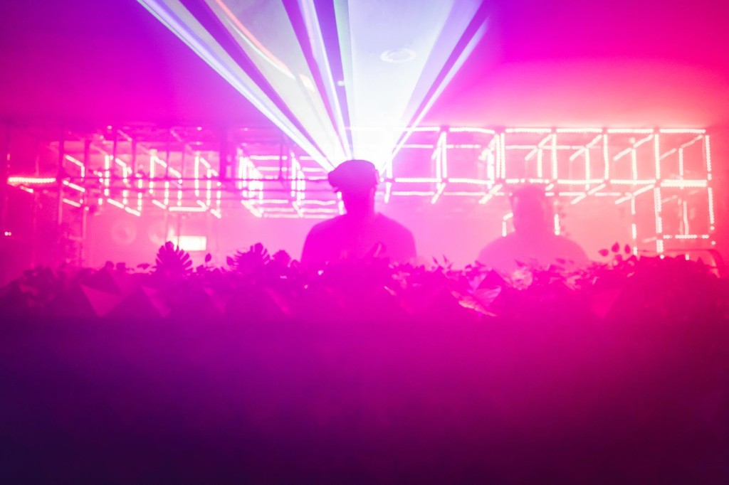 Empty main room with Vision sign and purple lighting