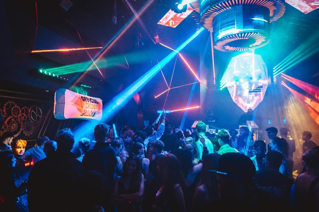 Crowd under blue LED ceiling at MN1
